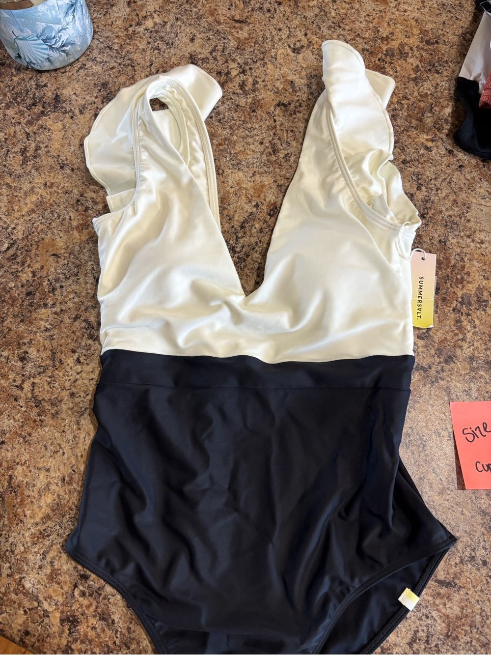 Ivory and Black Ruffled One-Piece Swimsuit